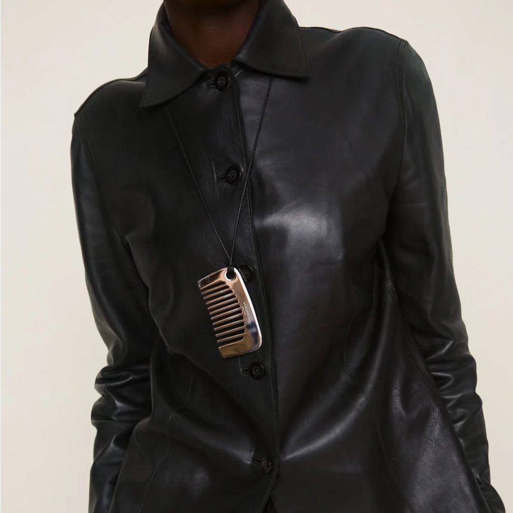 Verified Comb Silver Tone And Leather Necklace